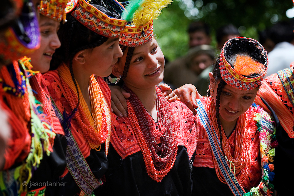 The Kalash claim legendary ancestry of descendents of Alexander the Great's armies left after campaigns in South Asia. Existing in the Hindu Kush Valleys of North West Pakistan, the pagan people believe in one god, Dezau.  Life is divided into pure (onjesta) and impure (pragata) spheres which impact greatly on daily life. The Kalash festival involves intricate religious ceremonies, feasts and dancing. Men usually stand in the centre beating drums with women dancing and encircling, their arms around each otherÕs waists or shoulders.